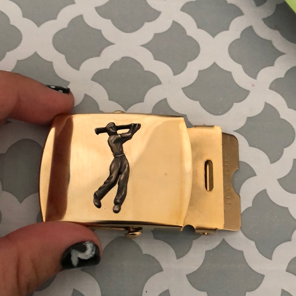 Golfer belt buckle